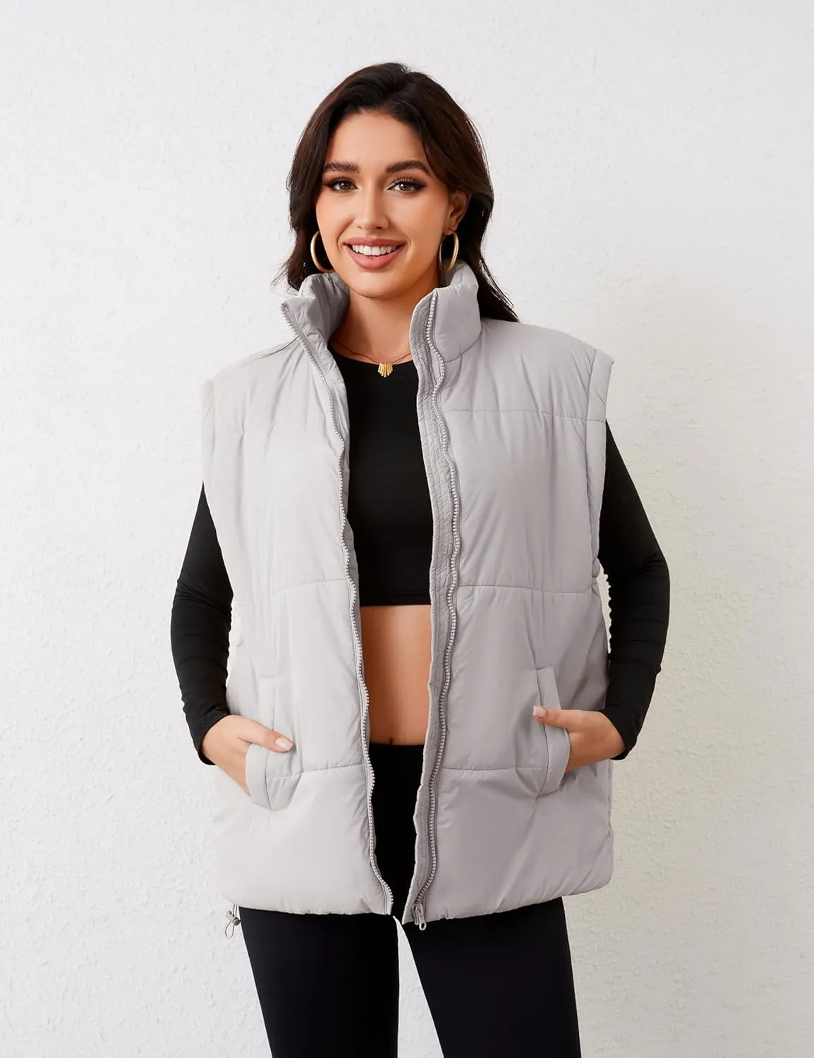 APAFES Women Winter Oversized Puffer Vest Lightweight Stand Collar Flysleeve Insulated Padded Puffy Jackets Coat with Pockets