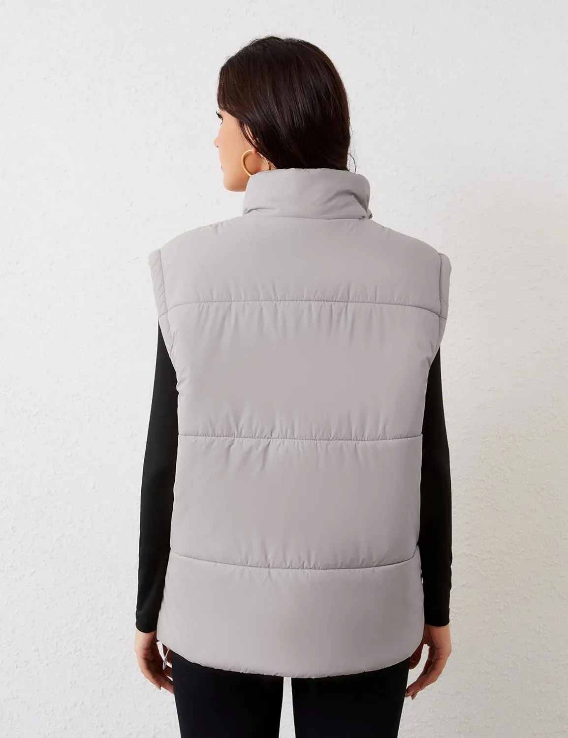 APAFES Women Winter Oversized Puffer Vest Lightweight Stand Collar Flysleeve Insulated Padded Puffy Jackets Coat with Pockets