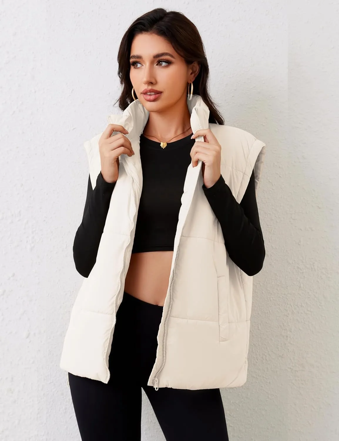 APAFES Women Winter Oversized Puffer Vest Lightweight Stand Collar Flysleeve Insulated Padded Puffy Jackets Coat with Pockets