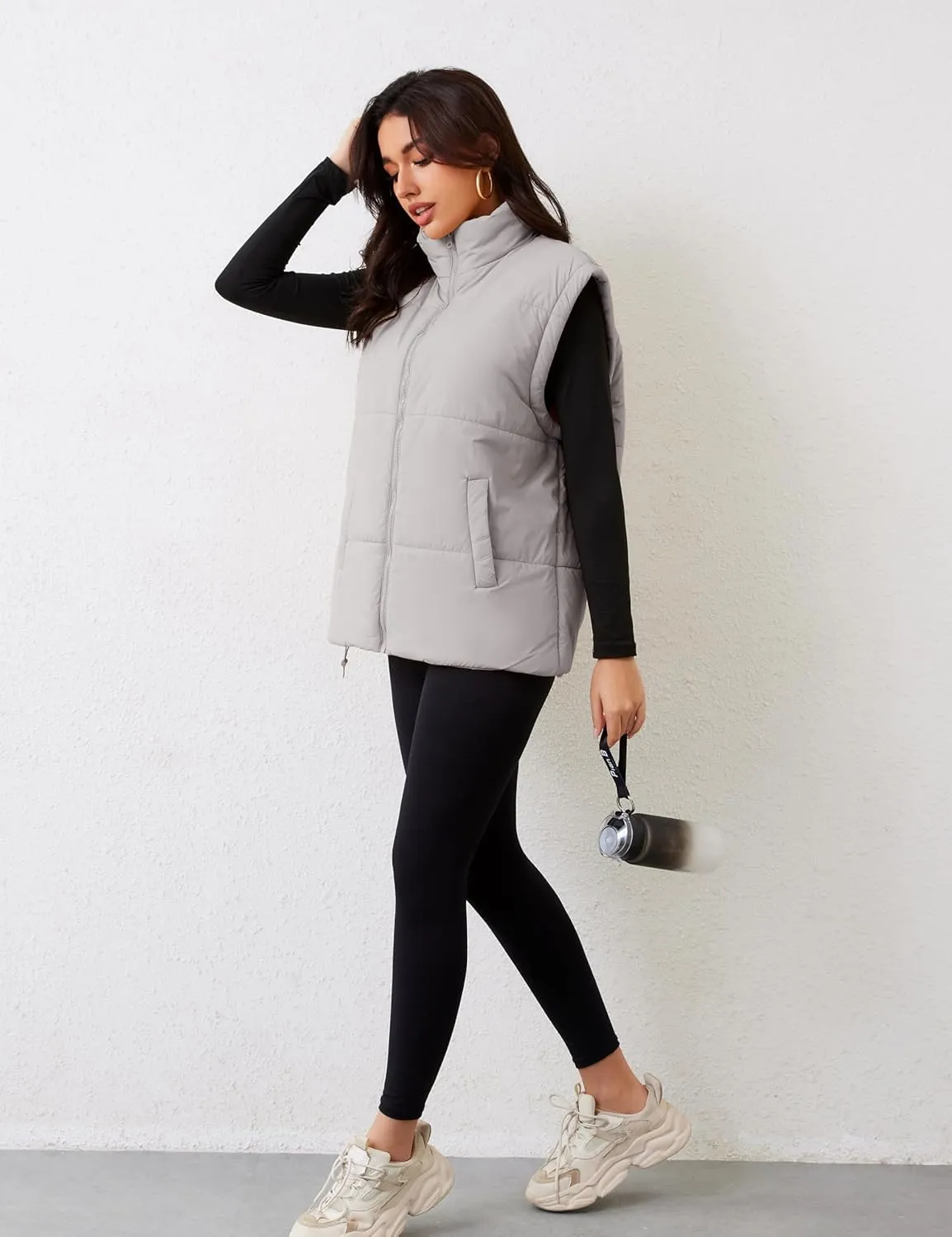 APAFES Women Winter Oversized Puffer Vest Lightweight Stand Collar Flysleeve Insulated Padded Puffy Jackets Coat with Pockets