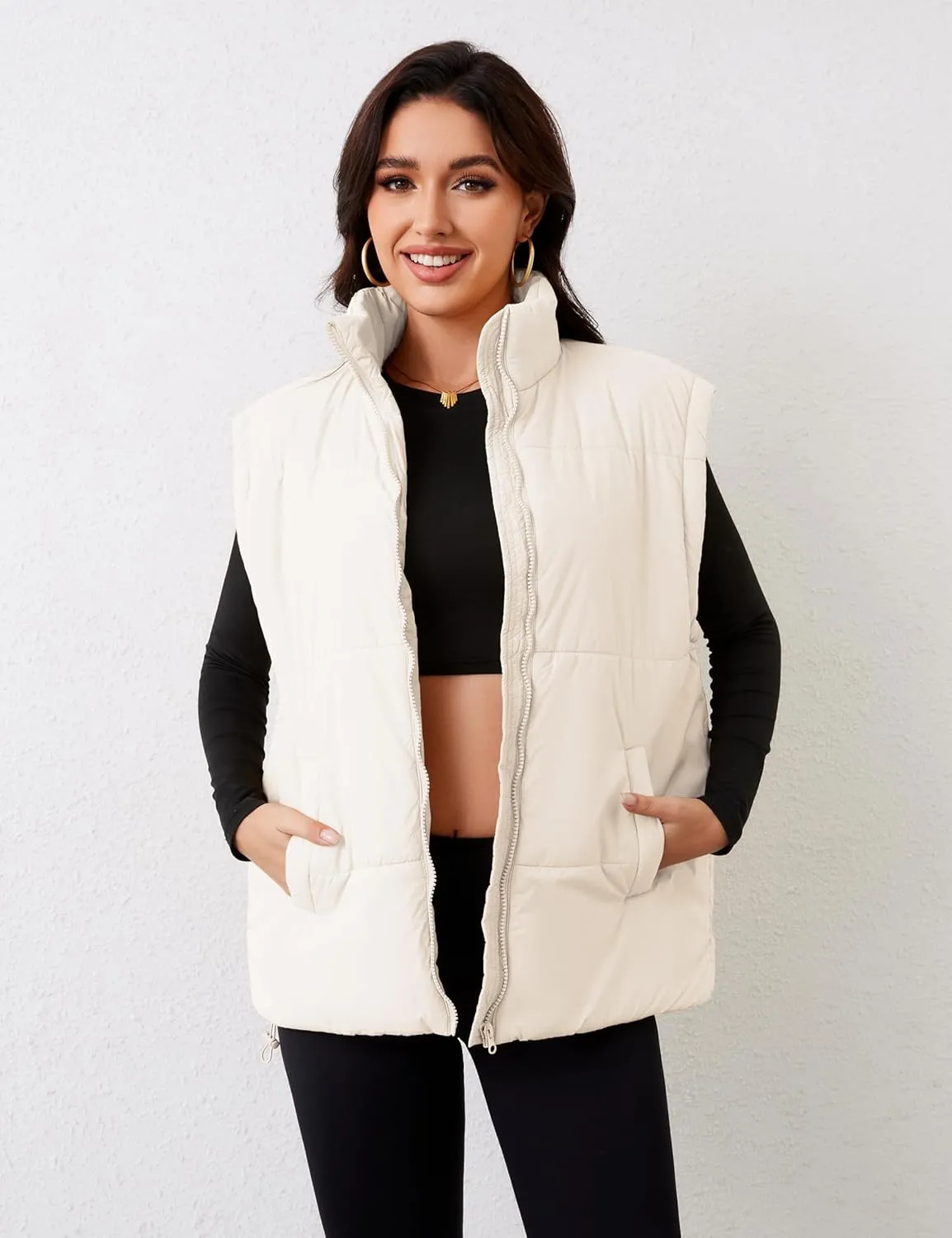 APAFES Women Winter Oversized Puffer Vest Lightweight Stand Collar Flysleeve Insulated Padded Puffy Jackets Coat with Pockets