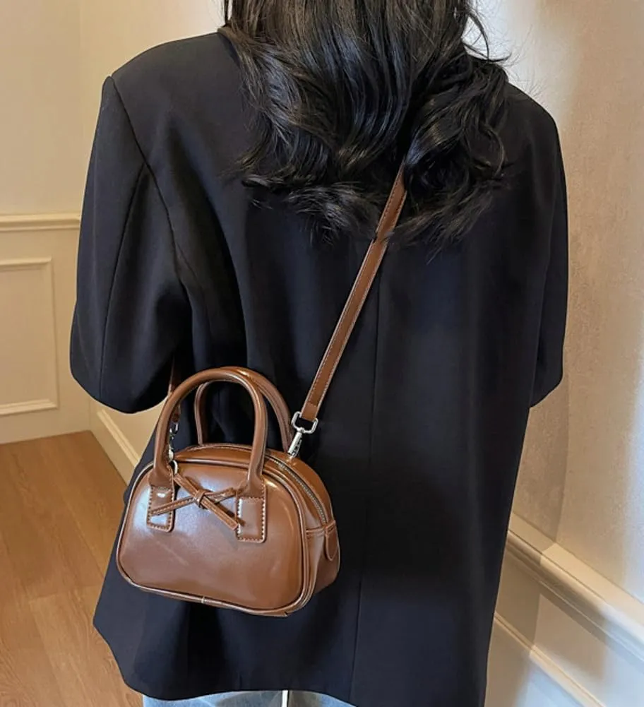 Womens Small Shoulder Handbag Cute Bow-tie Boston Crossbody Bag Soft PU Leather Hobo Bag Stylish Purse 2025