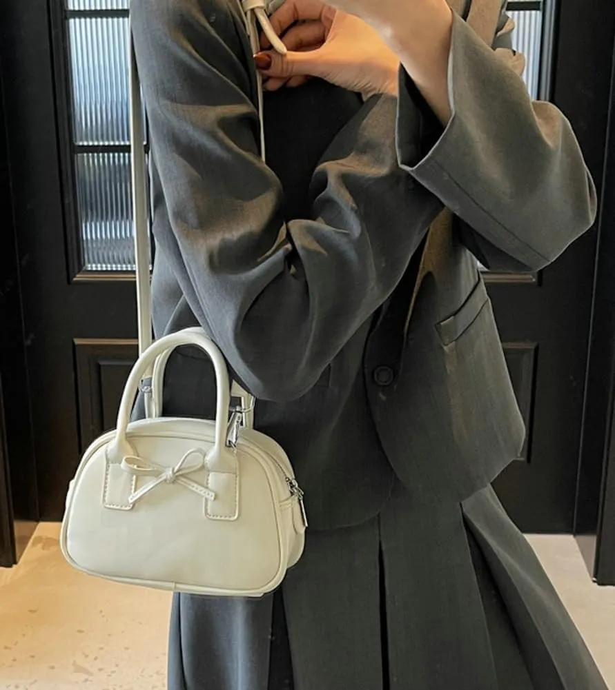 Womens Small Shoulder Handbag Cute Bow-tie Boston Crossbody Bag Soft PU Leather Hobo Bag Stylish Purse 2025